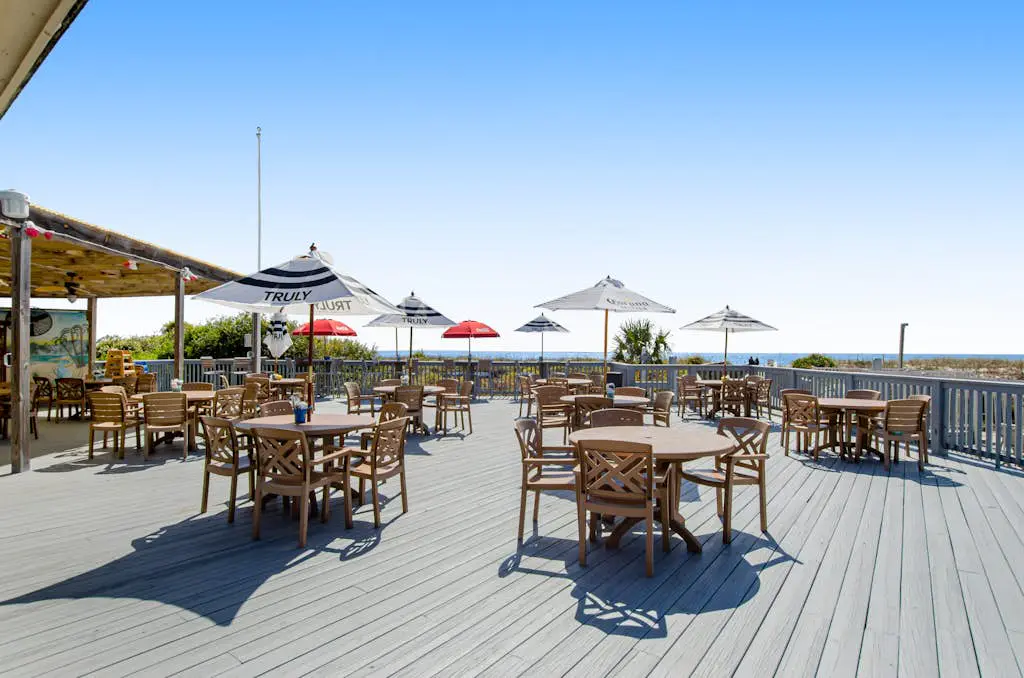 Water view retreat with balcony, beach gear, pools, tennis, hot tub, & gym