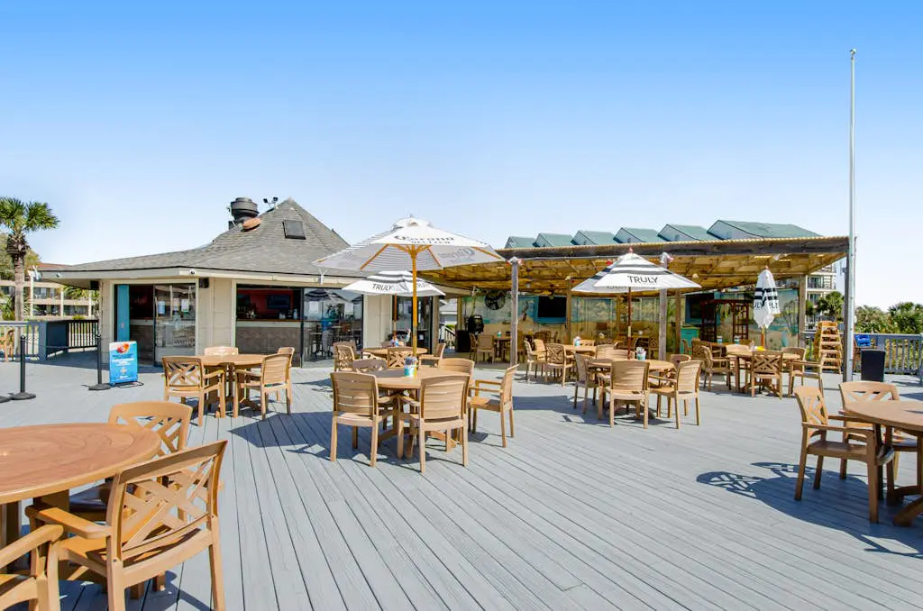 Water view retreat with balcony, beach gear, pools, tennis, hot tub, & gym
