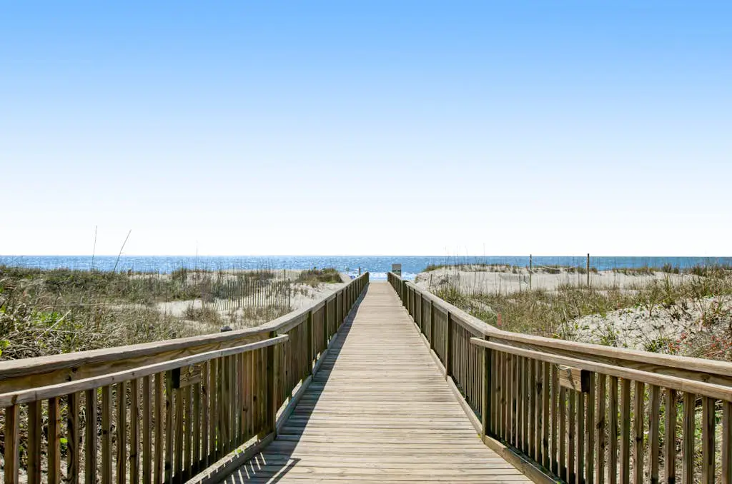 Water view retreat with balcony, beach gear, pools, tennis, hot tub, & gym