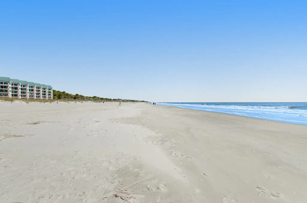 Water view retreat with balcony, beach gear, pools, tennis, hot tub, & gym