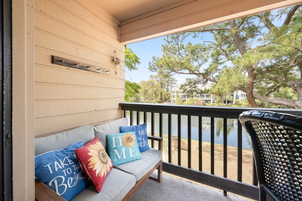 Water view retreat with balcony, beach gear, pools, tennis, hot tub, & gym