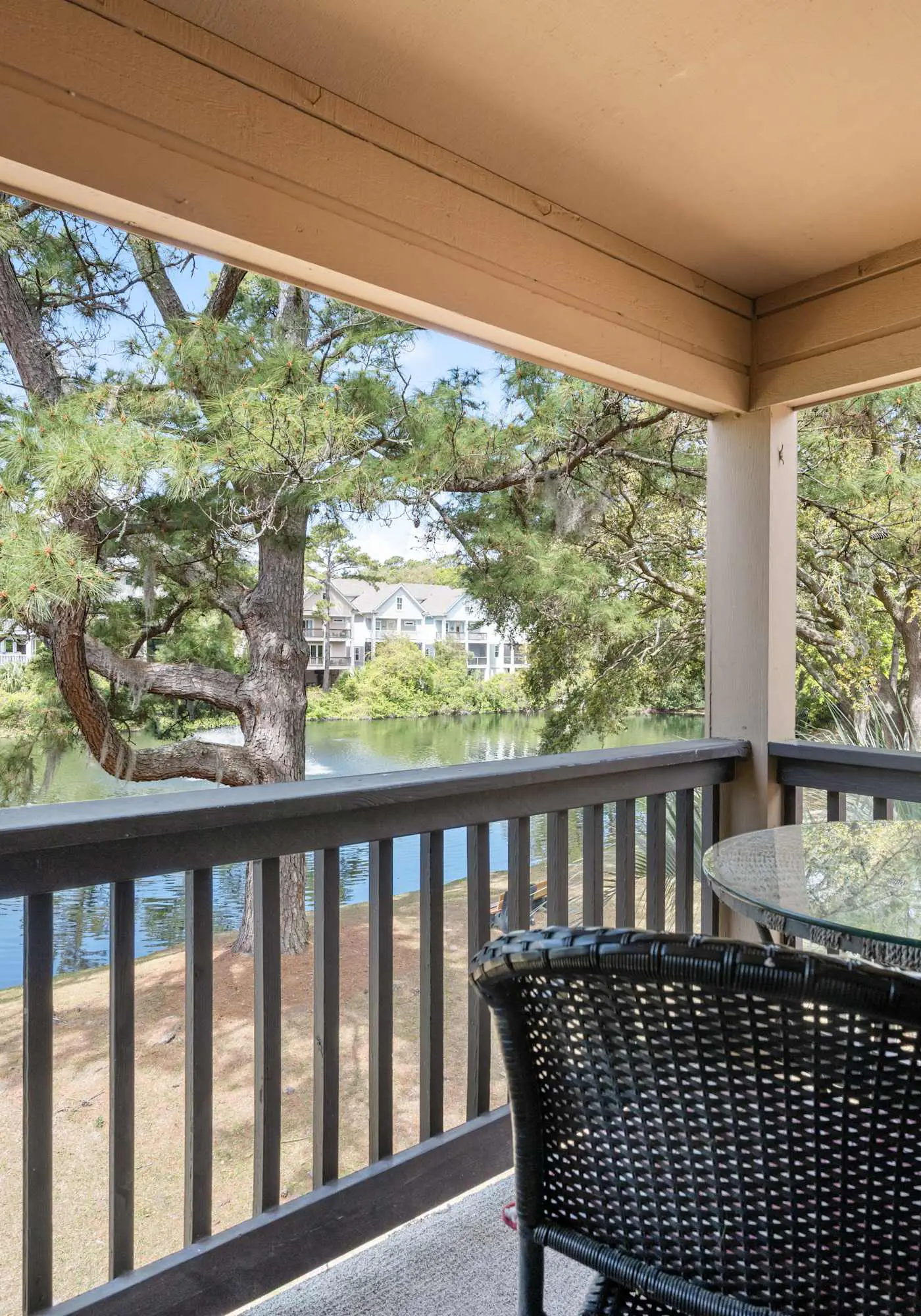 Water view retreat with balcony, beach gear, pools, tennis, hot tub, & gym