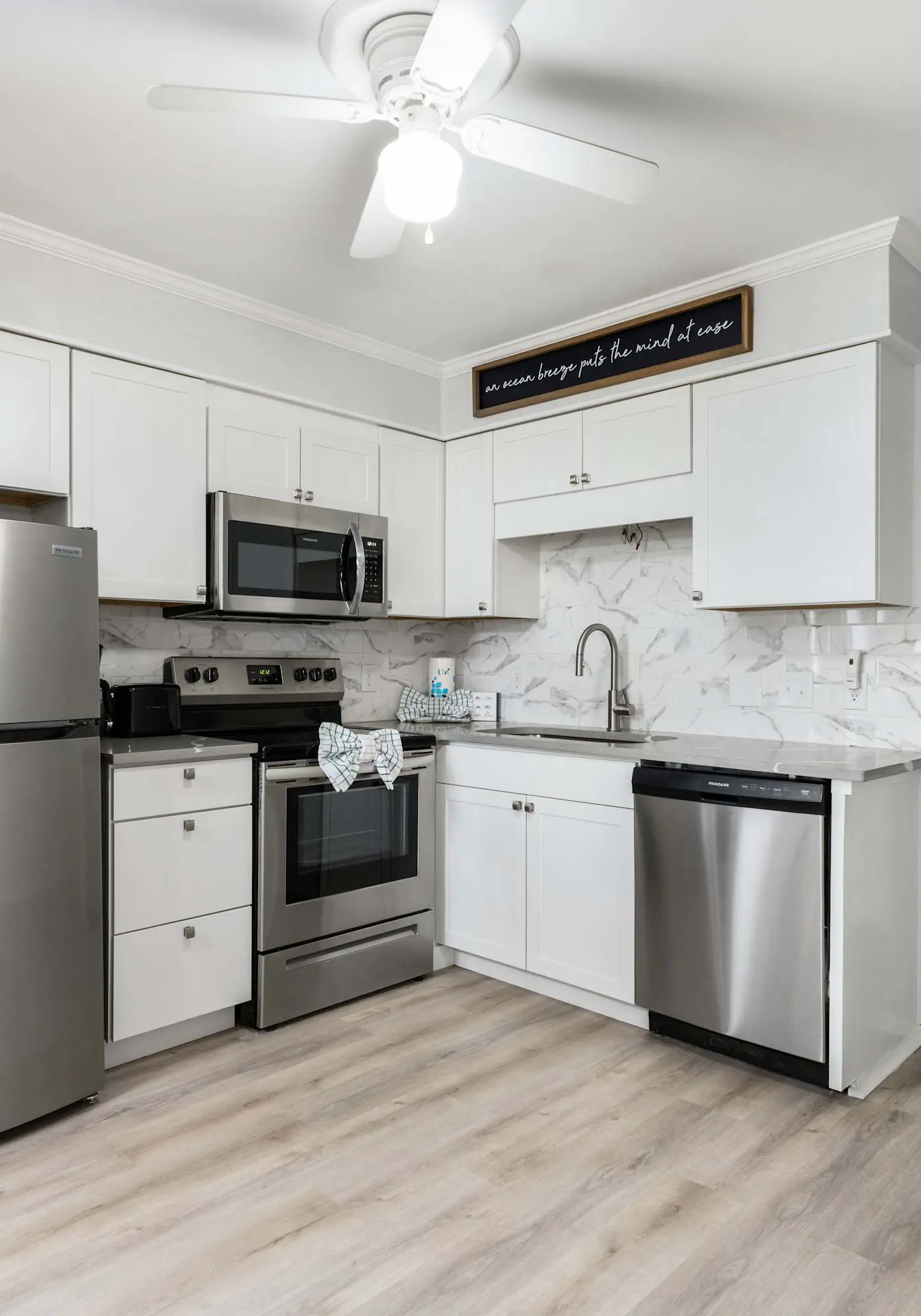Water view retreat with balcony, beach gear, pools, tennis, hot tub, & gym