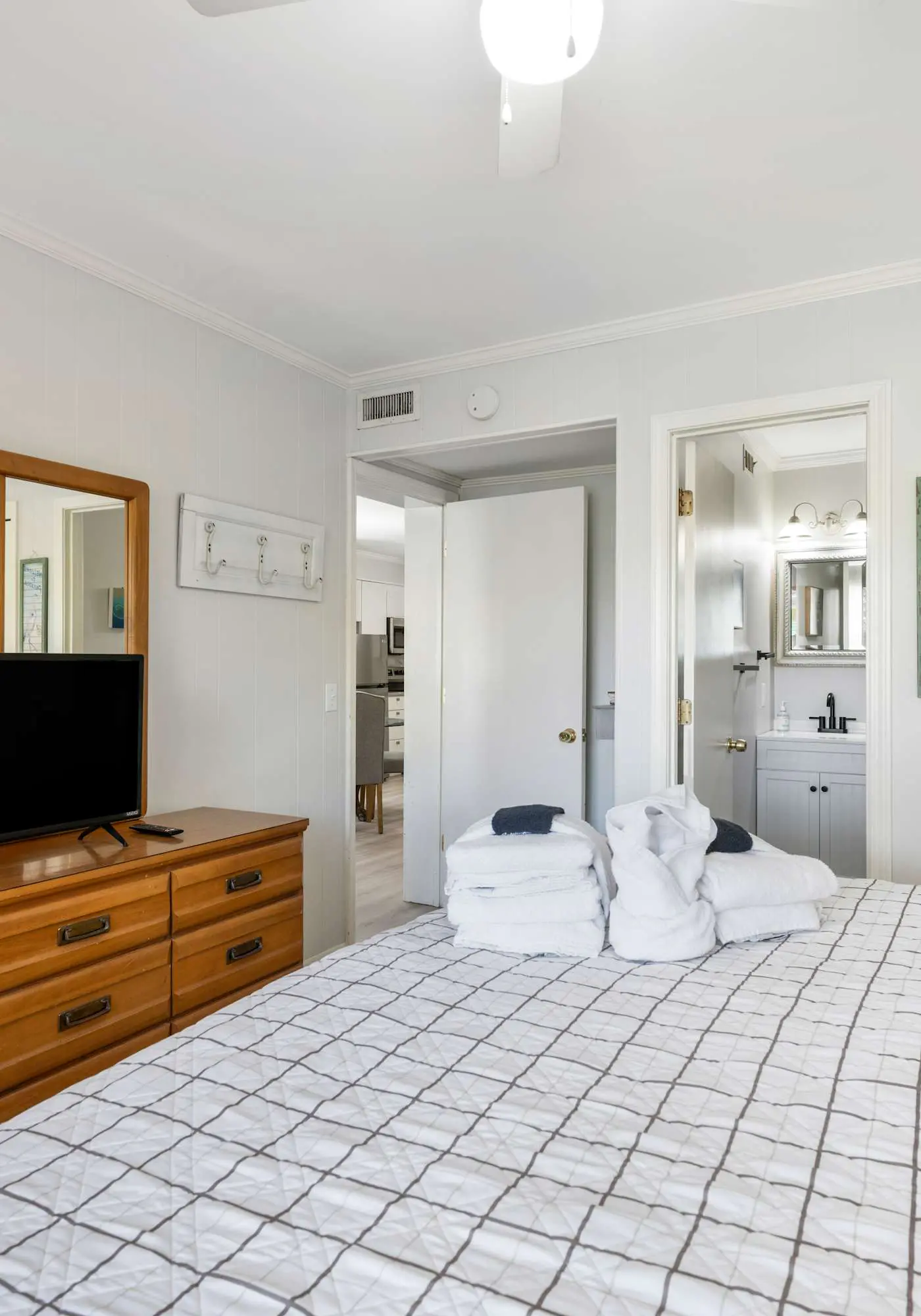 Water view retreat with balcony, beach gear, pools, tennis, hot tub, & gym