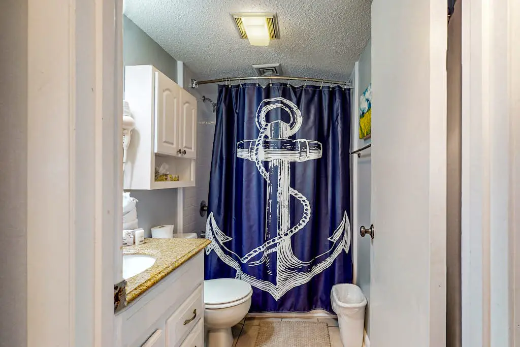 Updated coastal villa with pools, athletic courts, gym, smart TVs, AC, & W/D