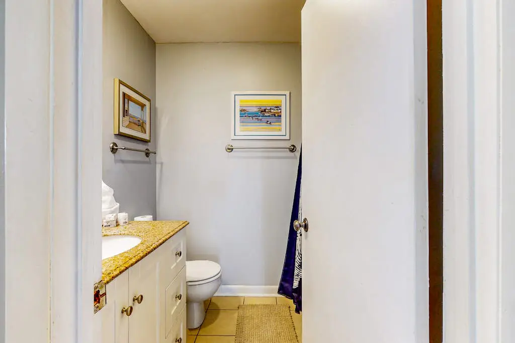 Updated coastal villa with pools, athletic courts, gym, smart TVs, AC, & W/D