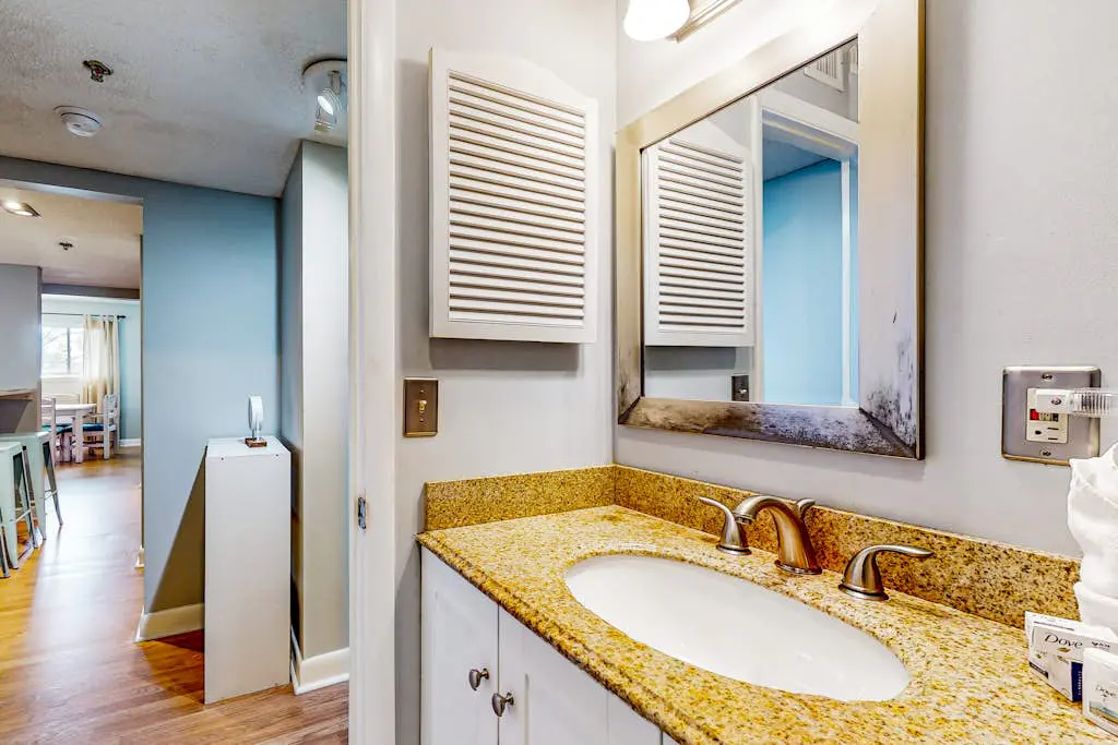 Updated coastal villa with pools, athletic courts, gym, smart TVs, AC, & W/D
