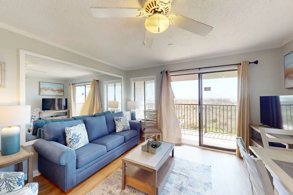 1st-floor condo near the beach with pool, tennis, balcony, gym, streaming, W/D