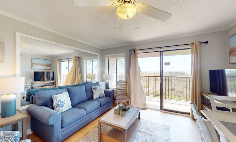 1st-floor condo near the beach with pool, tennis, balcony, gym, streaming, W/D