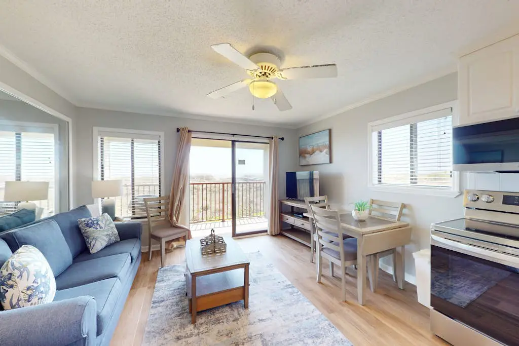 1st-floor condo near the beach with pool, tennis, balcony, gym, streaming, W/D