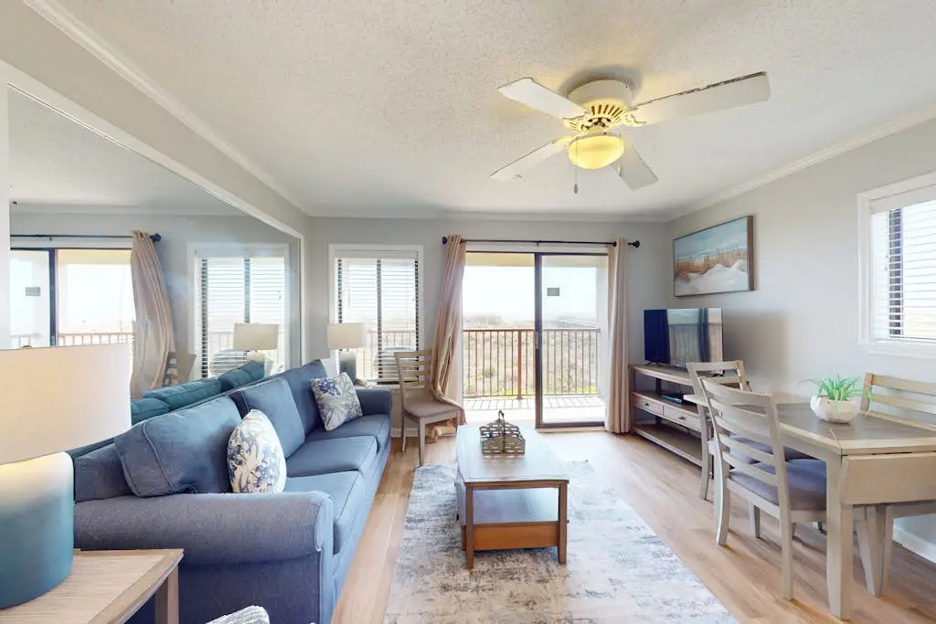 1st-floor condo near the beach with pool, tennis, balcony, gym, streaming, W/D