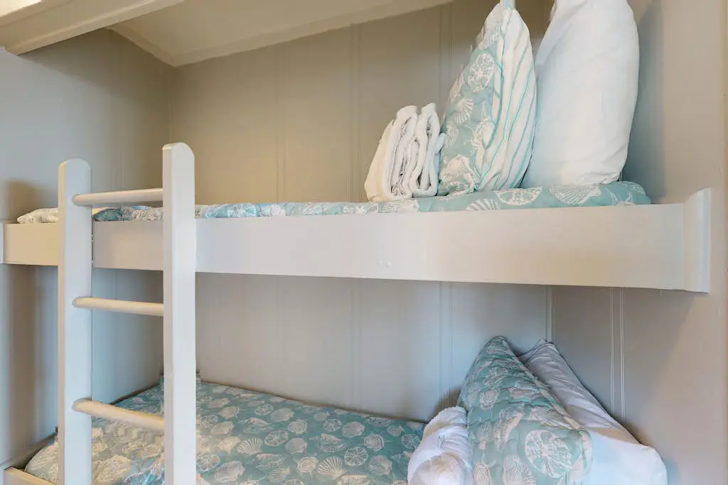 1st-floor condo near the beach with pool, tennis, balcony, gym, streaming, W/D