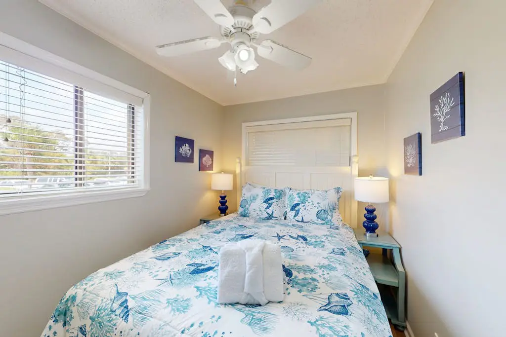 1st-floor condo near the beach with pool, tennis, balcony, gym, streaming, W/D