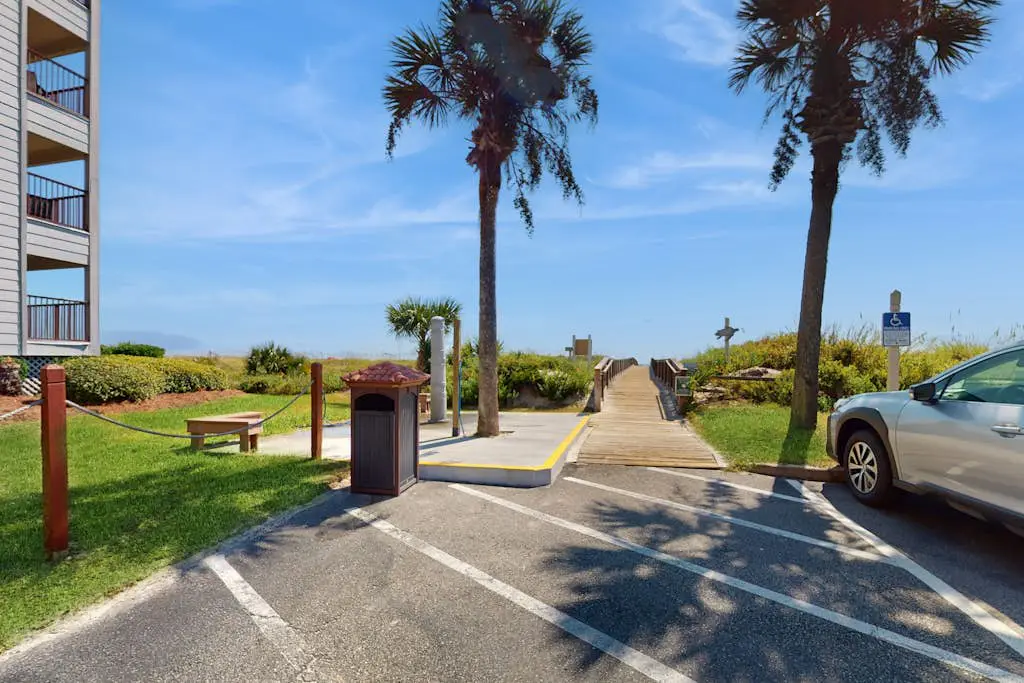 1st-floor condo near the beach with pool, tennis, balcony, gym, streaming, W/D