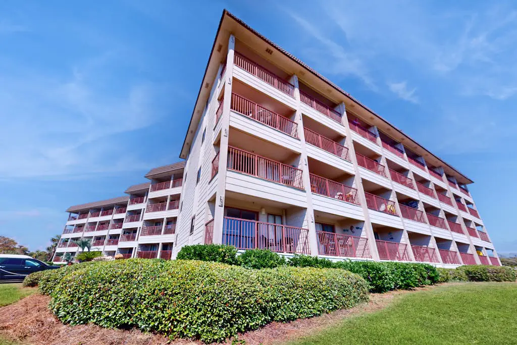 1st-floor condo near the beach with pool, tennis, balcony, gym, streaming, W/D