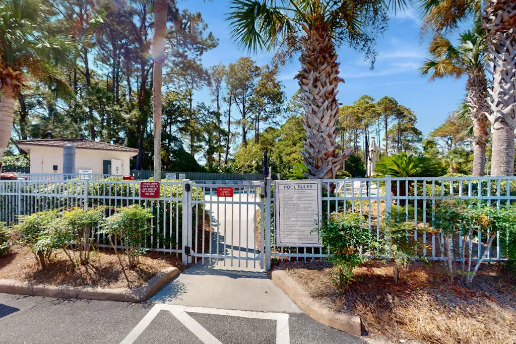 1st-floor condo near the beach with pool, tennis, balcony, gym, streaming, W/D