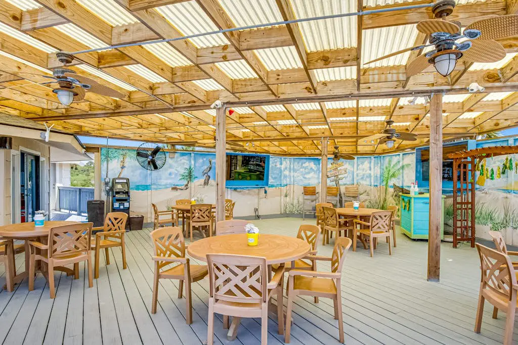 1st-floor condo near the beach with pool, tennis, balcony, gym, streaming, W/D