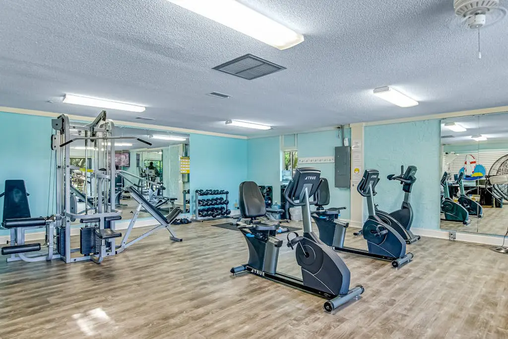 1st-floor condo near the beach with pool, tennis, balcony, gym, streaming, W/D