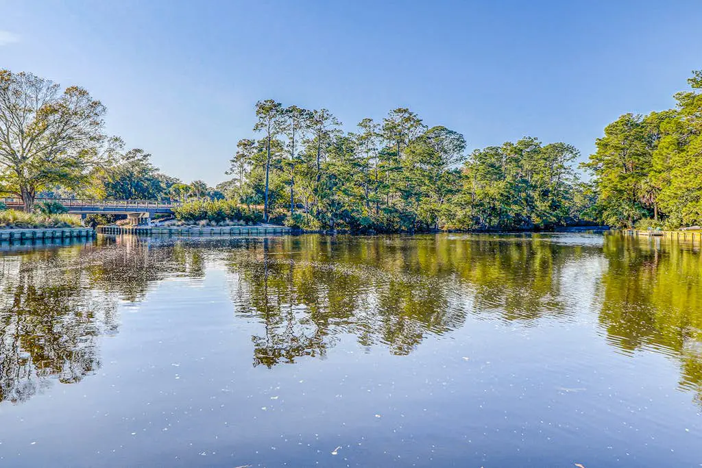 Snowbird-friendly golf getaway near the beach with pool, private deck, & W/D