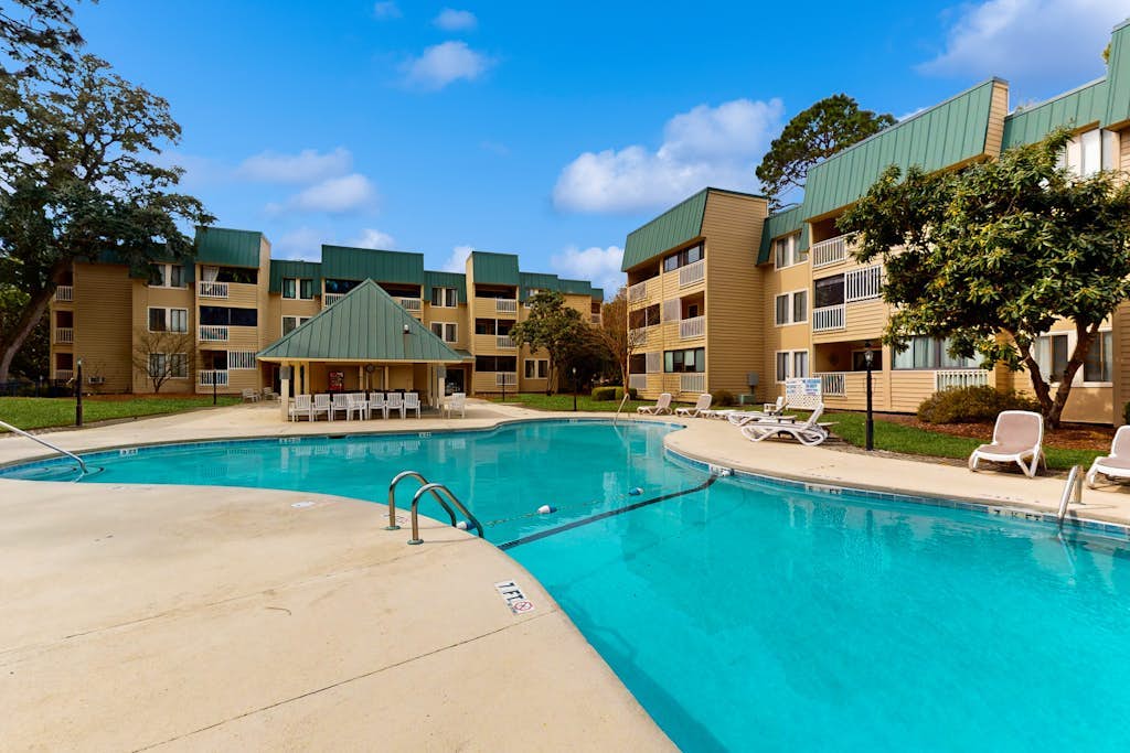 Beachfront villa near golf with pool, hot tub, & balcony - snowbird-friendly