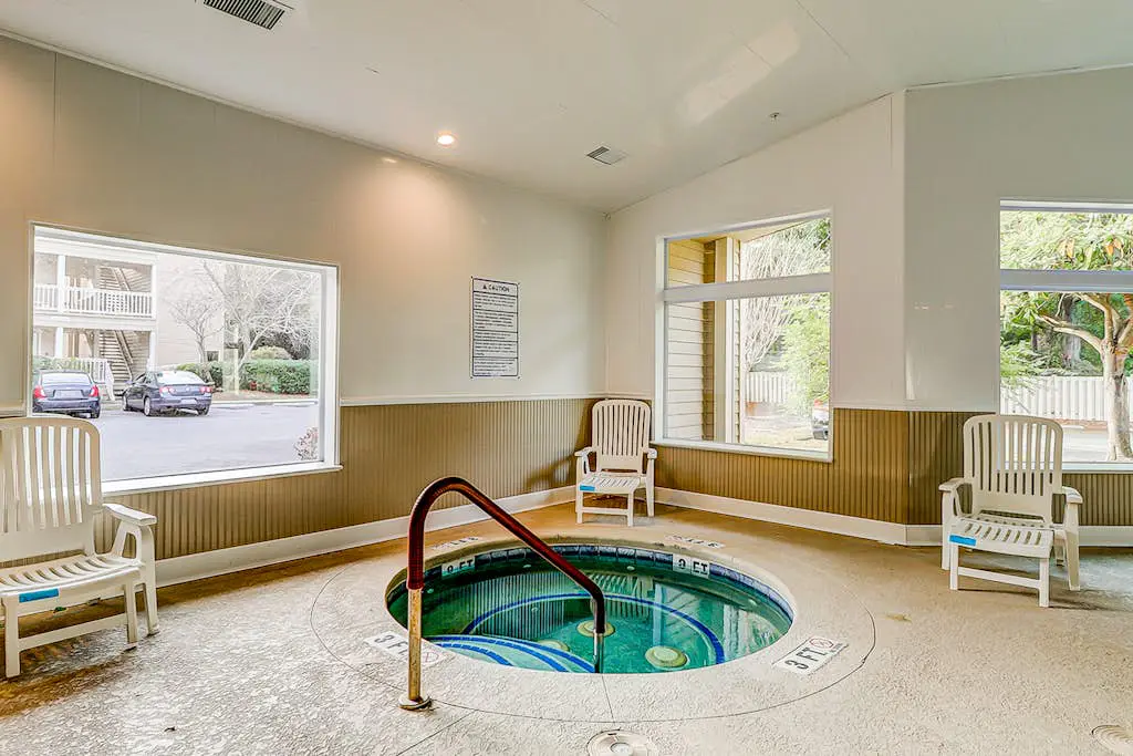 Beachfront villa near golf with pool, hot tub, & balcony - snowbird-friendly