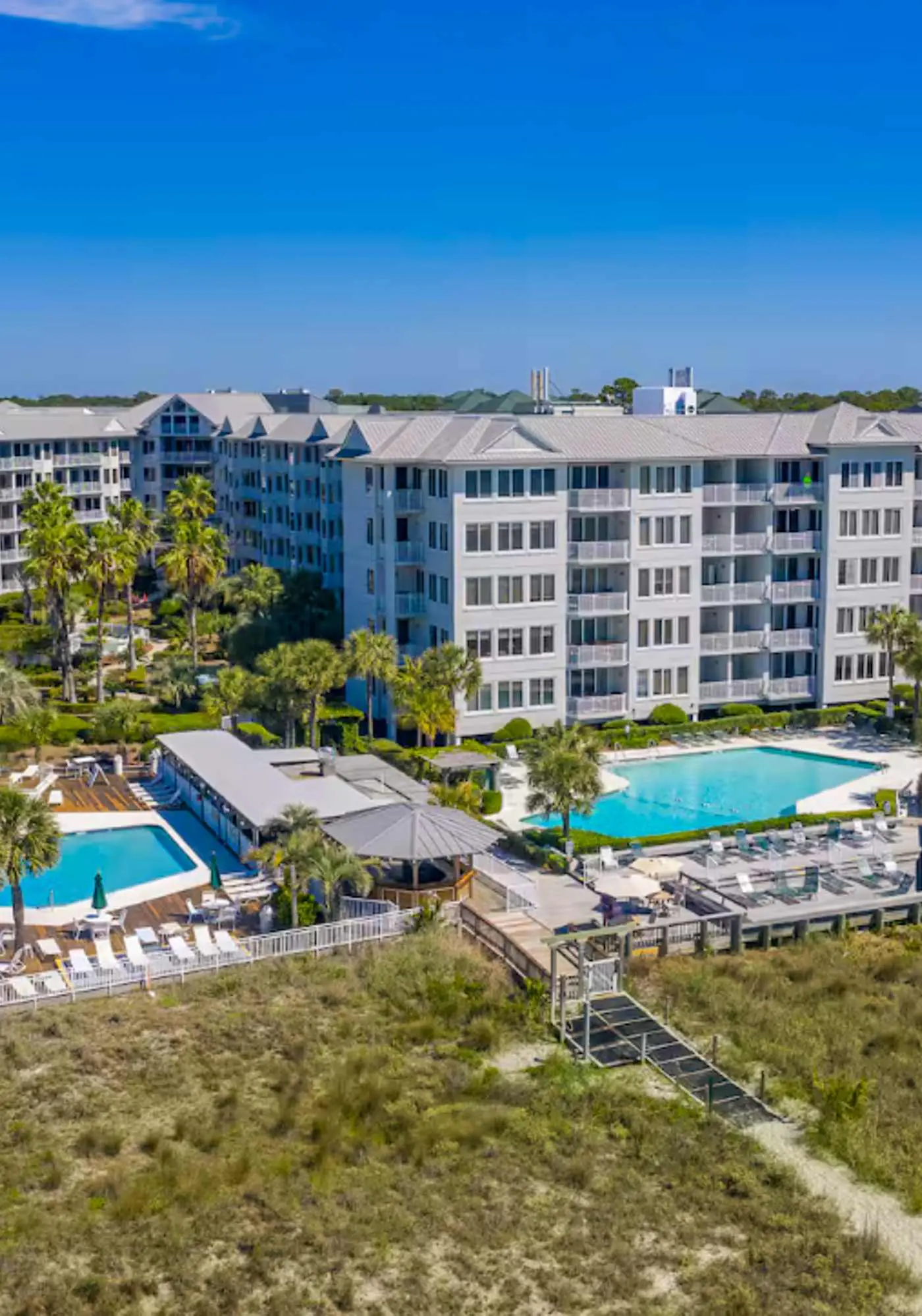 Oceanfront condo with pools, hot tubs, fitness room, & central AC