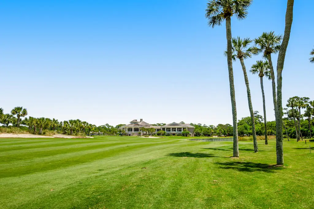 Coastal resort-style villa with pool, golf, & balcony - W/D, AC, & dog-friendly