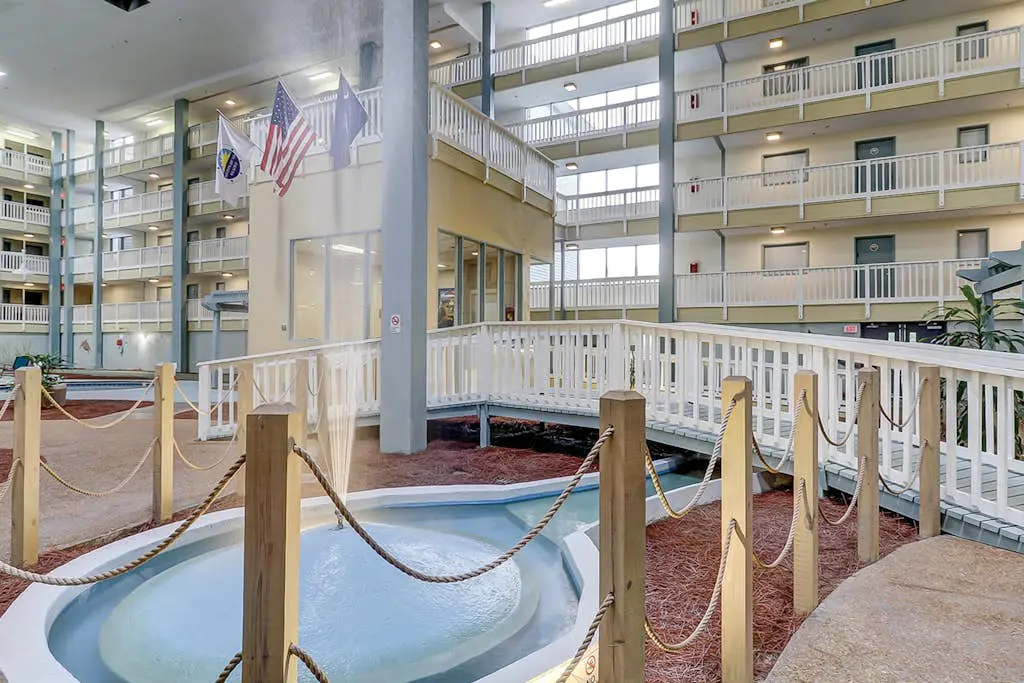 Updated Villa with beach access, amazing pools, fitness room, & tennis courts