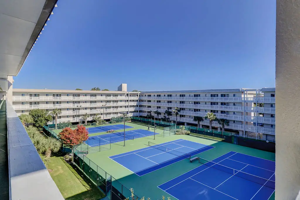 Updated Villa with beach access, amazing pools, fitness room, & tennis courts