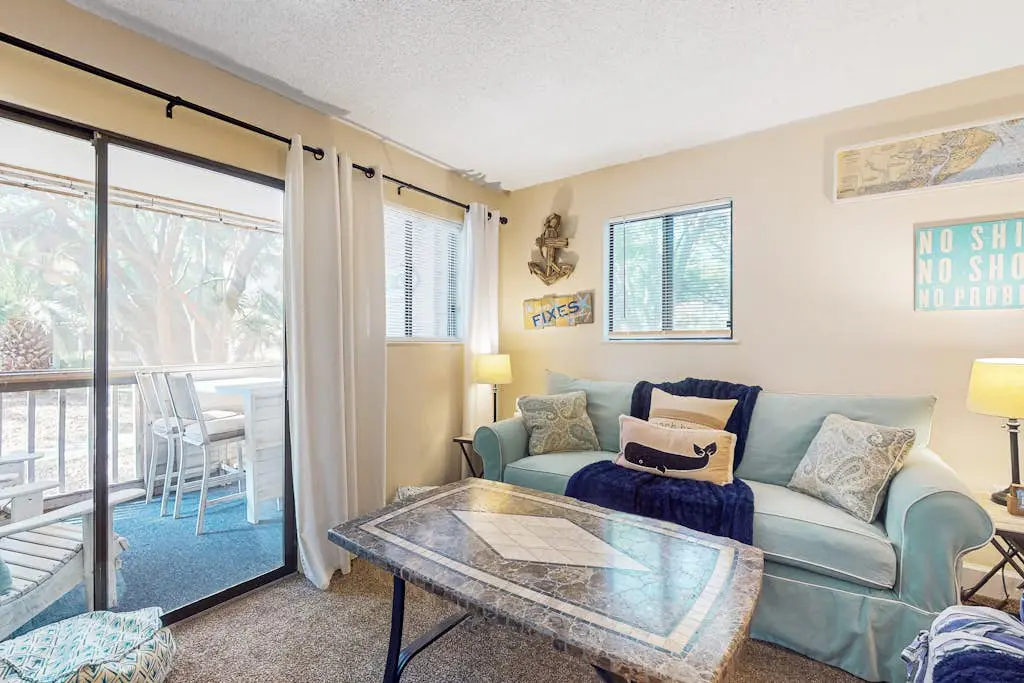 Villa by the beach with heated pools, hot tub, patio, tennis, central AC, & WD