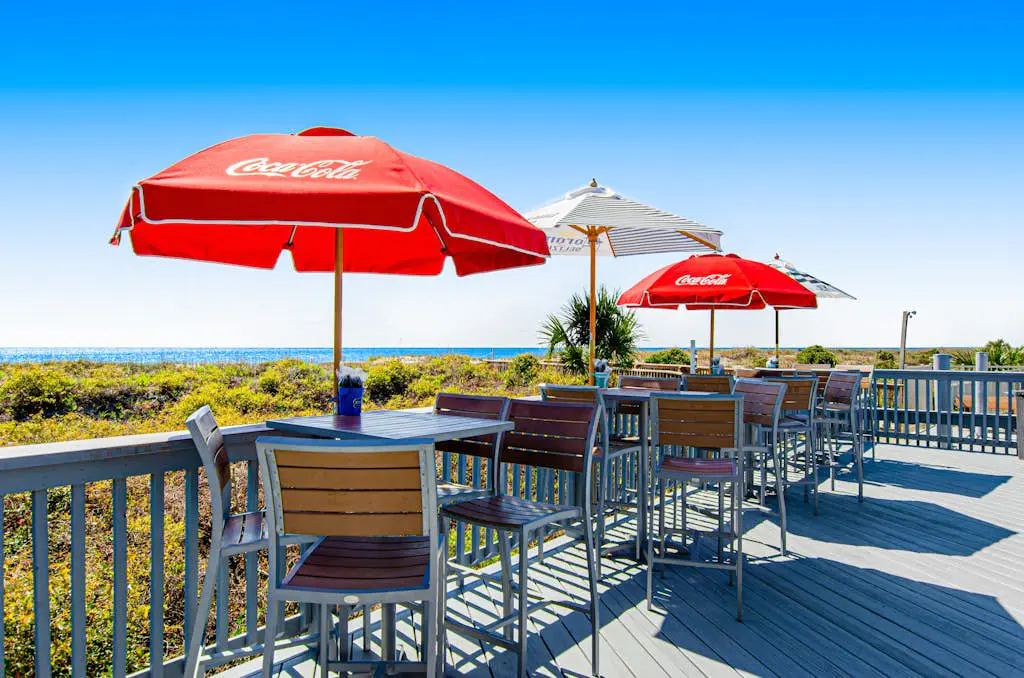 1st floor condo with  balcony, pools, tennis & close to beach