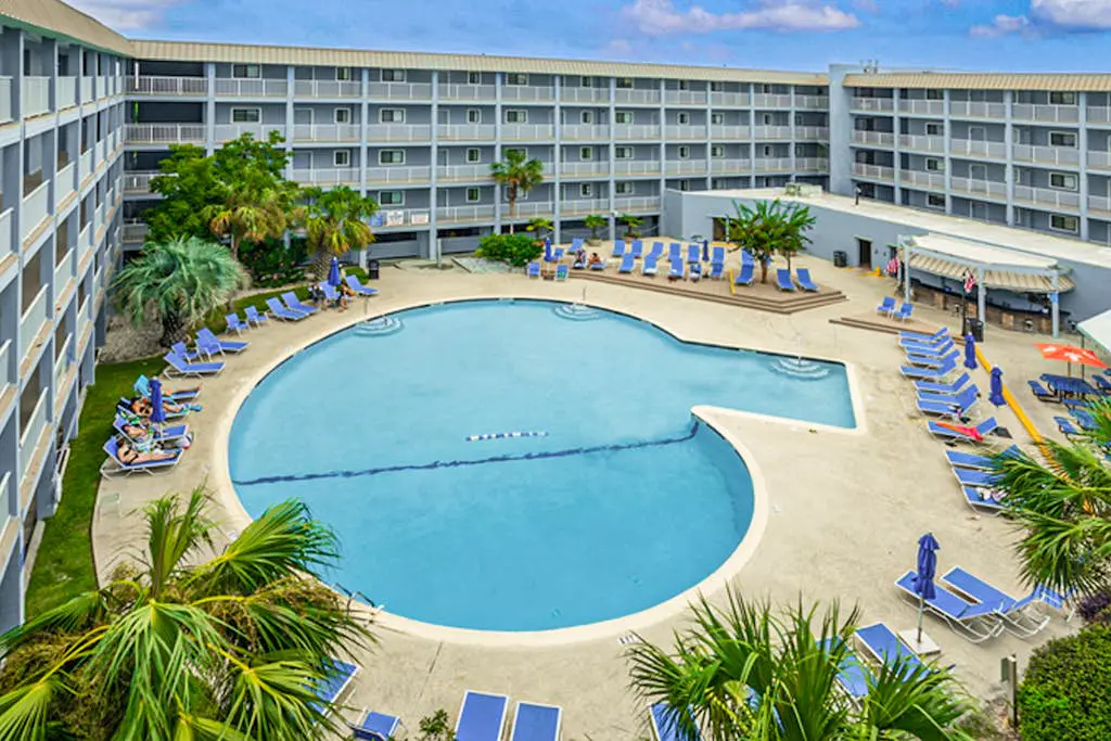 Updated getaway with pools, hot tub, close to beach