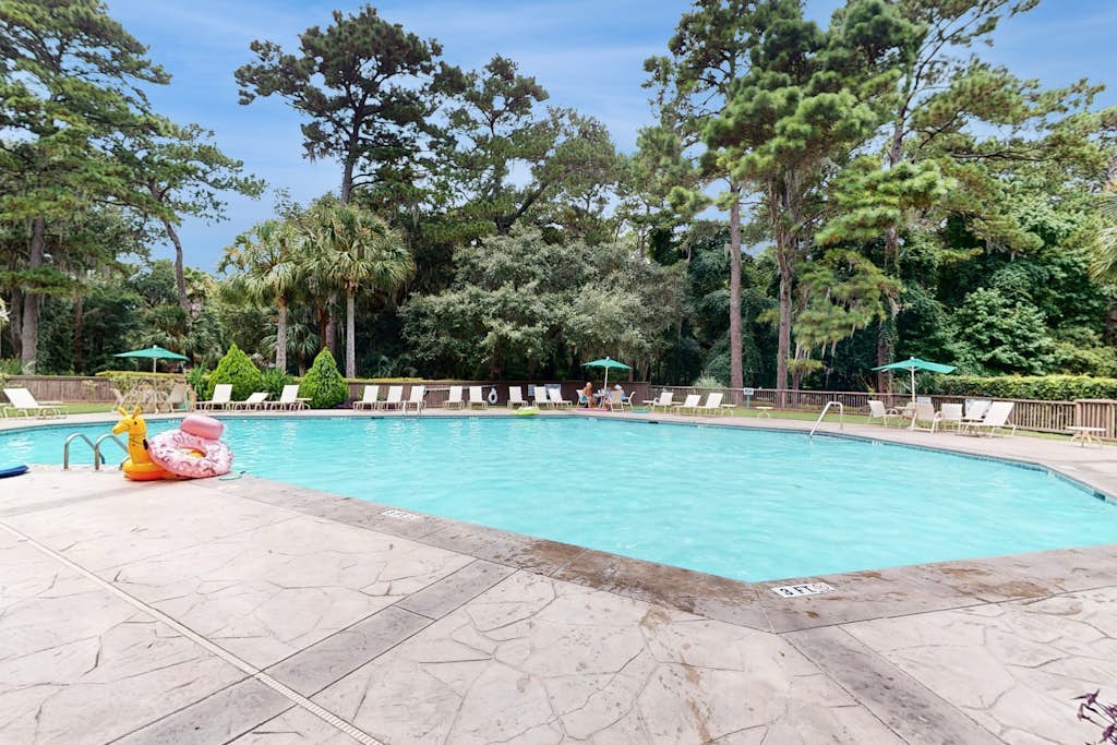 Charming condo with lagoons views, shared pool, golf nearby, and deck