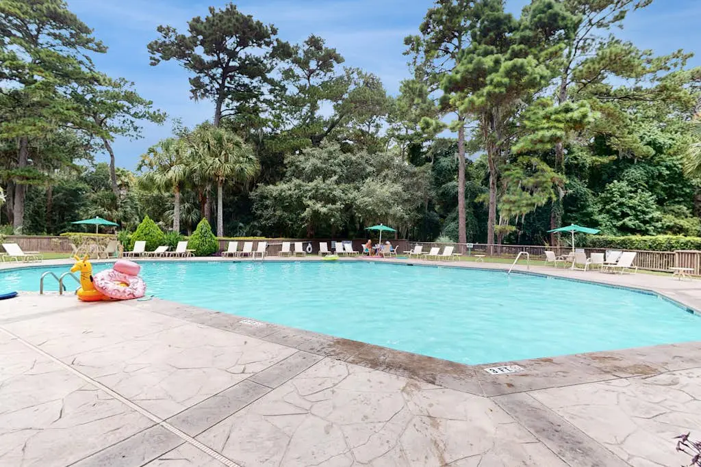 Charming condo with lagoons views, shared pool, golf nearby, and deck