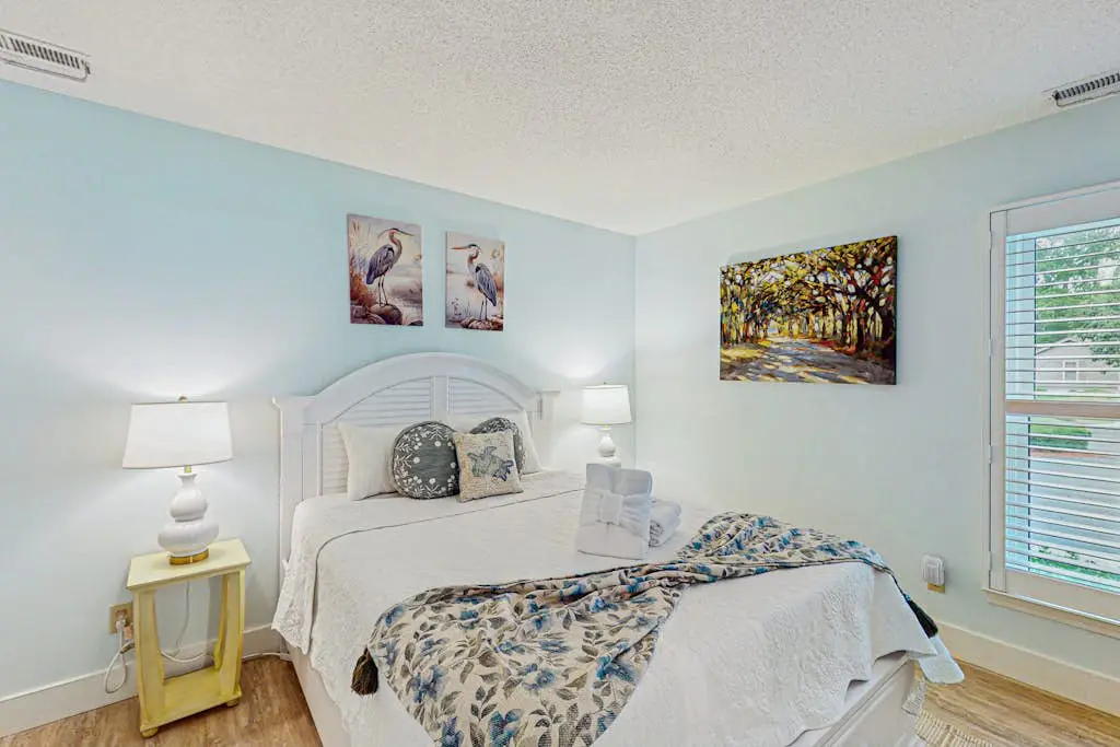 Charming condo with lagoons views, shared pool, golf nearby, and deck