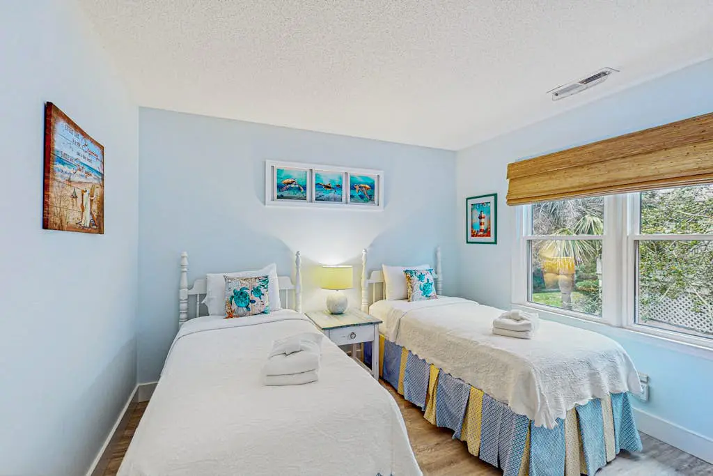 Charming condo with lagoons views, shared pool, golf nearby, and deck