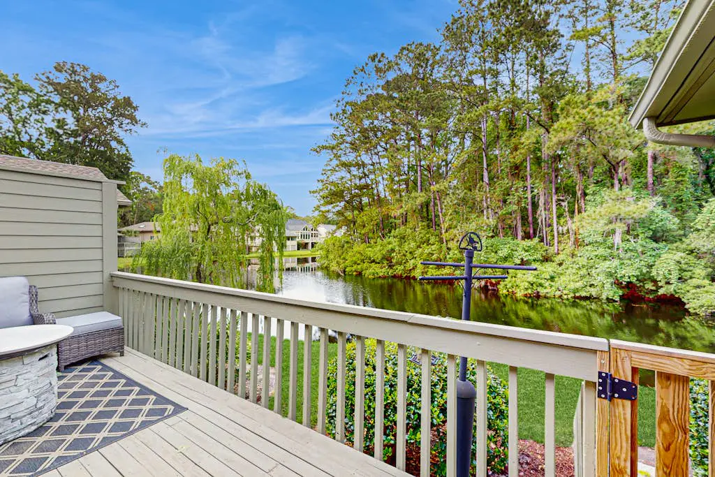 Charming condo with lagoons views, shared pool, golf nearby, and deck
