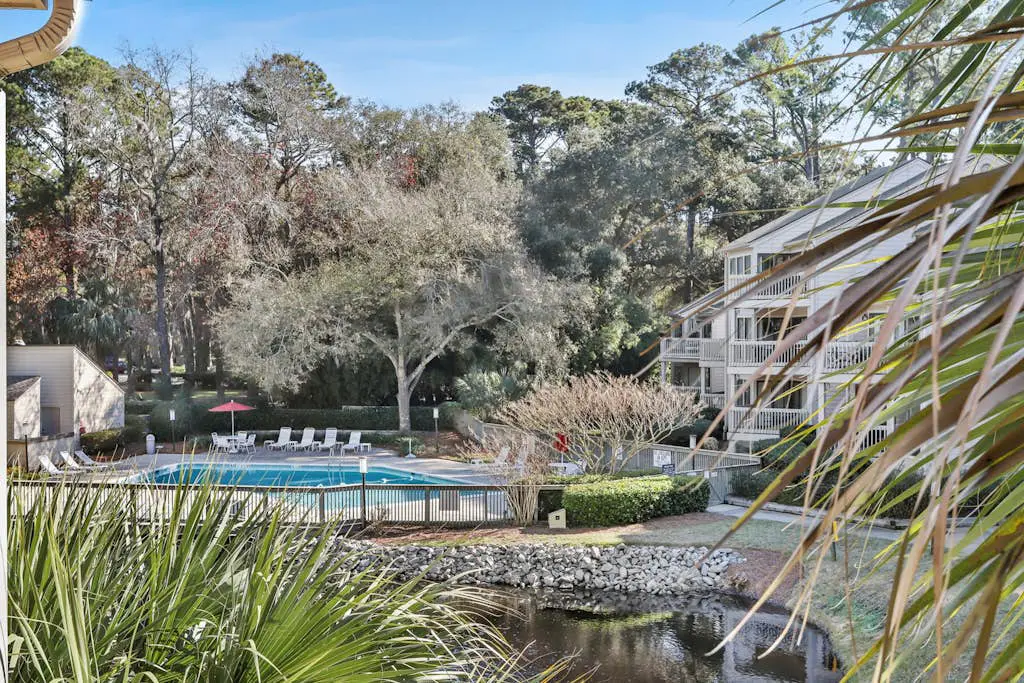 Spacious lagoon-view condo with tennis, outdoor pool, beach access, balcony