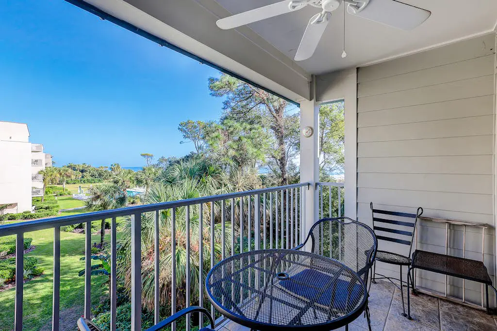 Relaxing ocean-view condo with on-site pool, private balcony & central AC