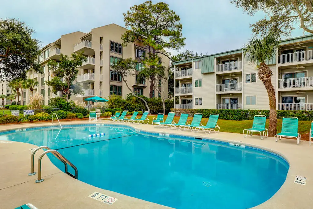 Relaxing ocean-view condo with on-site pool, private balcony & central AC