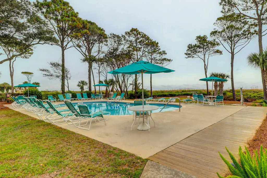 Relaxing ocean-view condo with on-site pool, private balcony & central AC