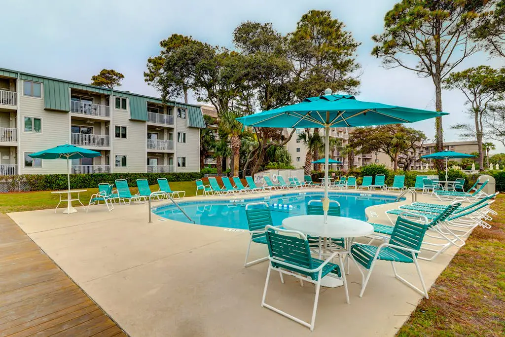 Relaxing ocean-view condo with on-site pool, private balcony & central AC