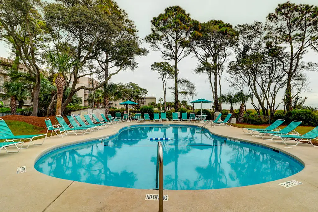 Relaxing ocean-view condo with on-site pool, private balcony & central AC