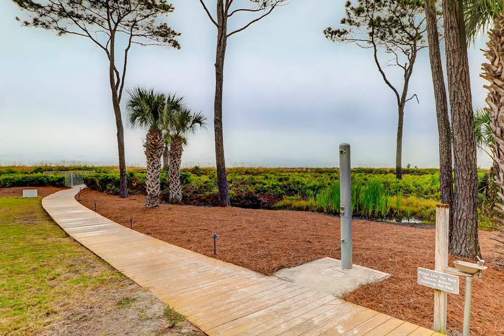Relaxing ocean-view condo with on-site pool, private balcony & central AC