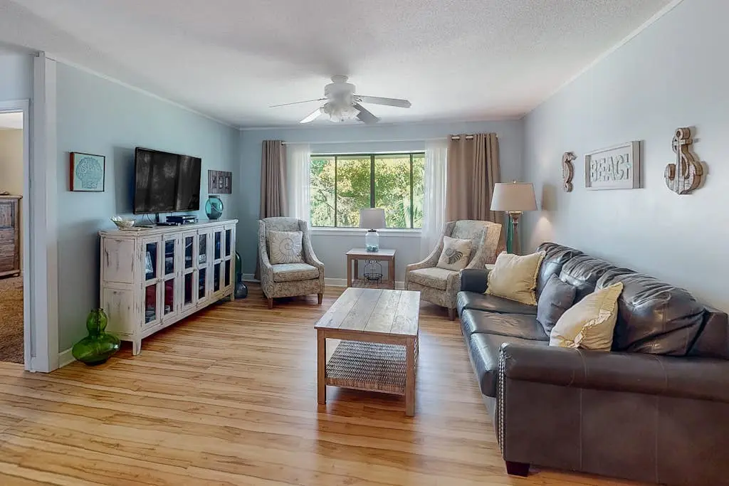Welcoming villa with pool, beach access, patio, central AC, & washer/dryer