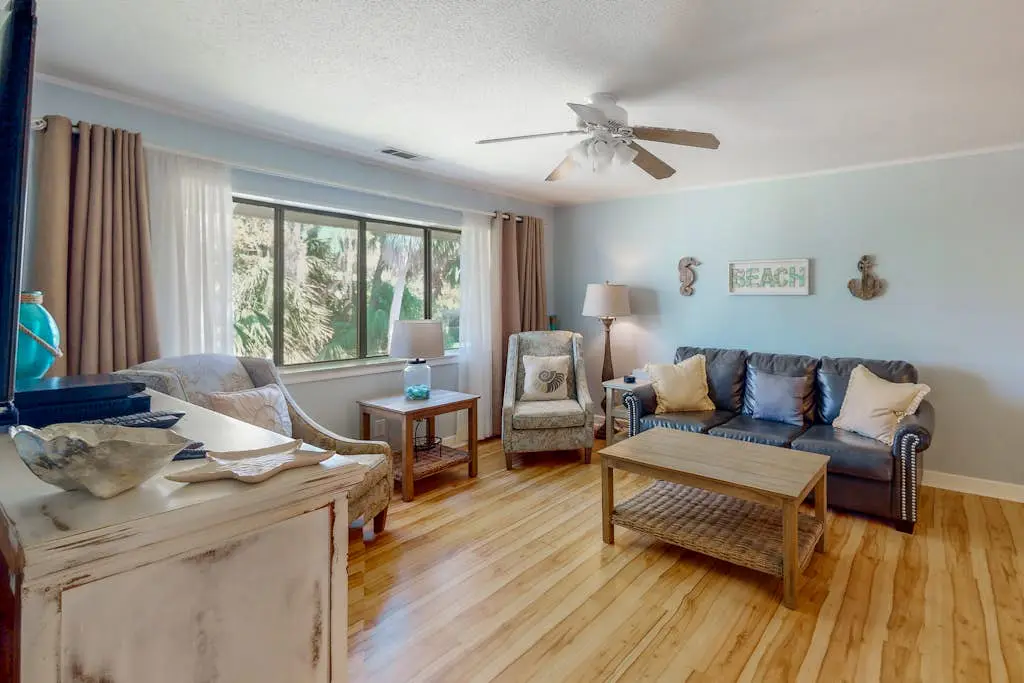 Welcoming villa with pool, beach access, patio, central AC, & washer/dryer