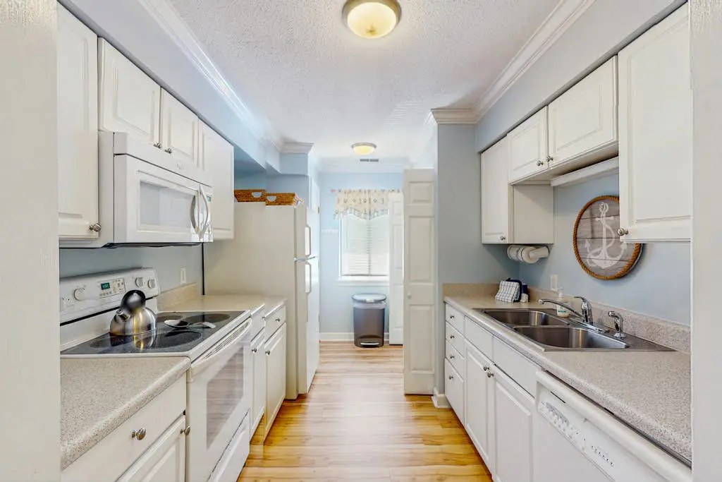 Welcoming villa with pool, beach access, patio, central AC, & washer/dryer