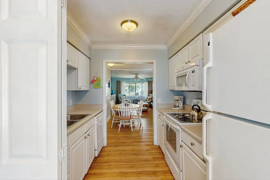 Welcoming villa with pool, beach access, patio, central AC, & washer/dryer