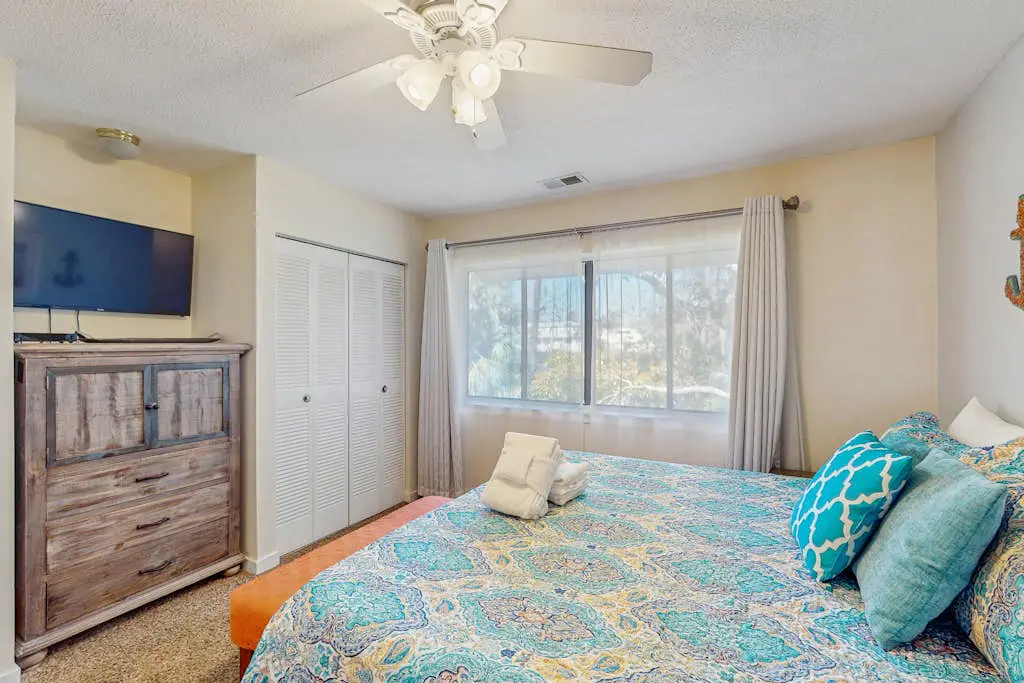 Welcoming villa with pool, beach access, patio, central AC, & washer/dryer