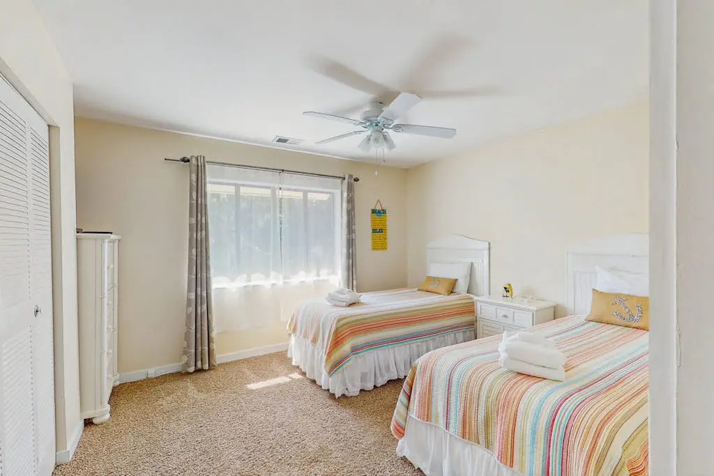 Welcoming villa with pool, beach access, patio, central AC, & washer/dryer